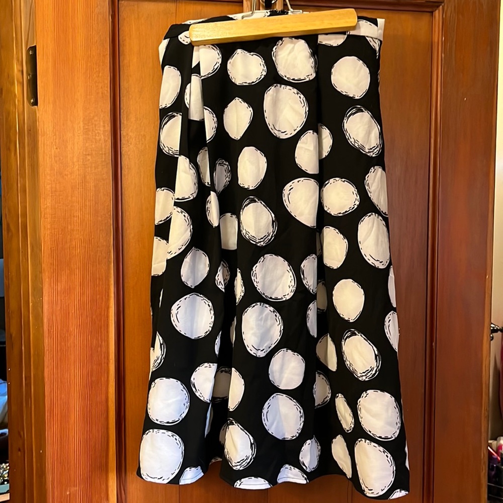 Fully lined NWT skirt. Black w/white polka dots. Front darts. NWT. Size small